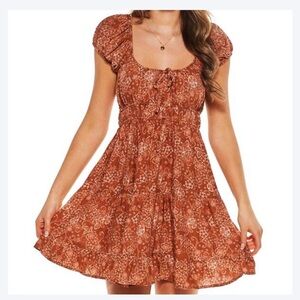 NO COMMENT Juniors floral tired hem mini dress size M
